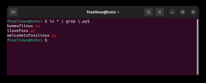 使用 grep 命令定位所有扩展名为 .py 的文件